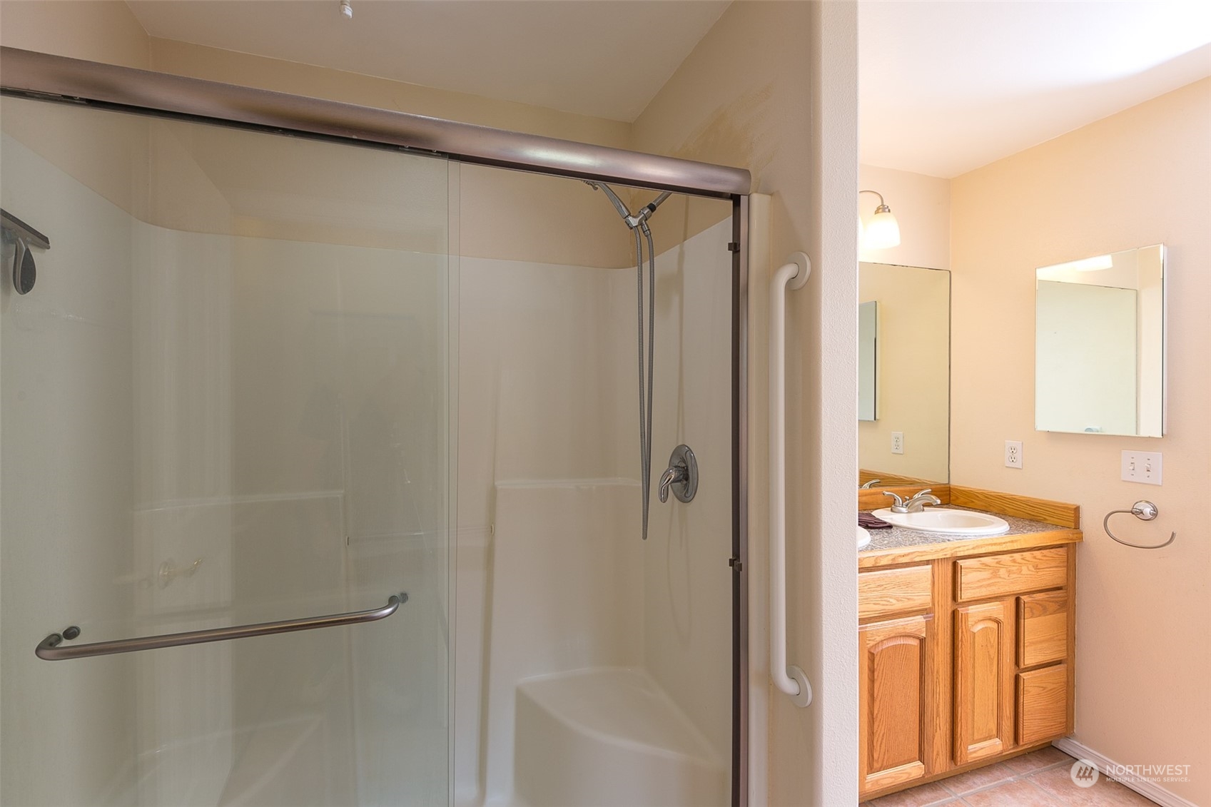 371 Autumn Road Sequim, WA 98382 - Photo 21 of 39 a bathroom with a shower and a sink