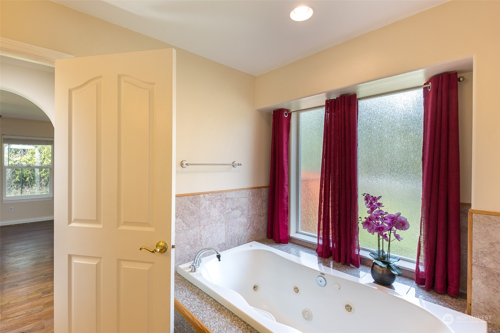 371 Autumn Road Sequim, WA 98382 - Photo 22 of 39 a very nice looking room with a large window and a chandelier