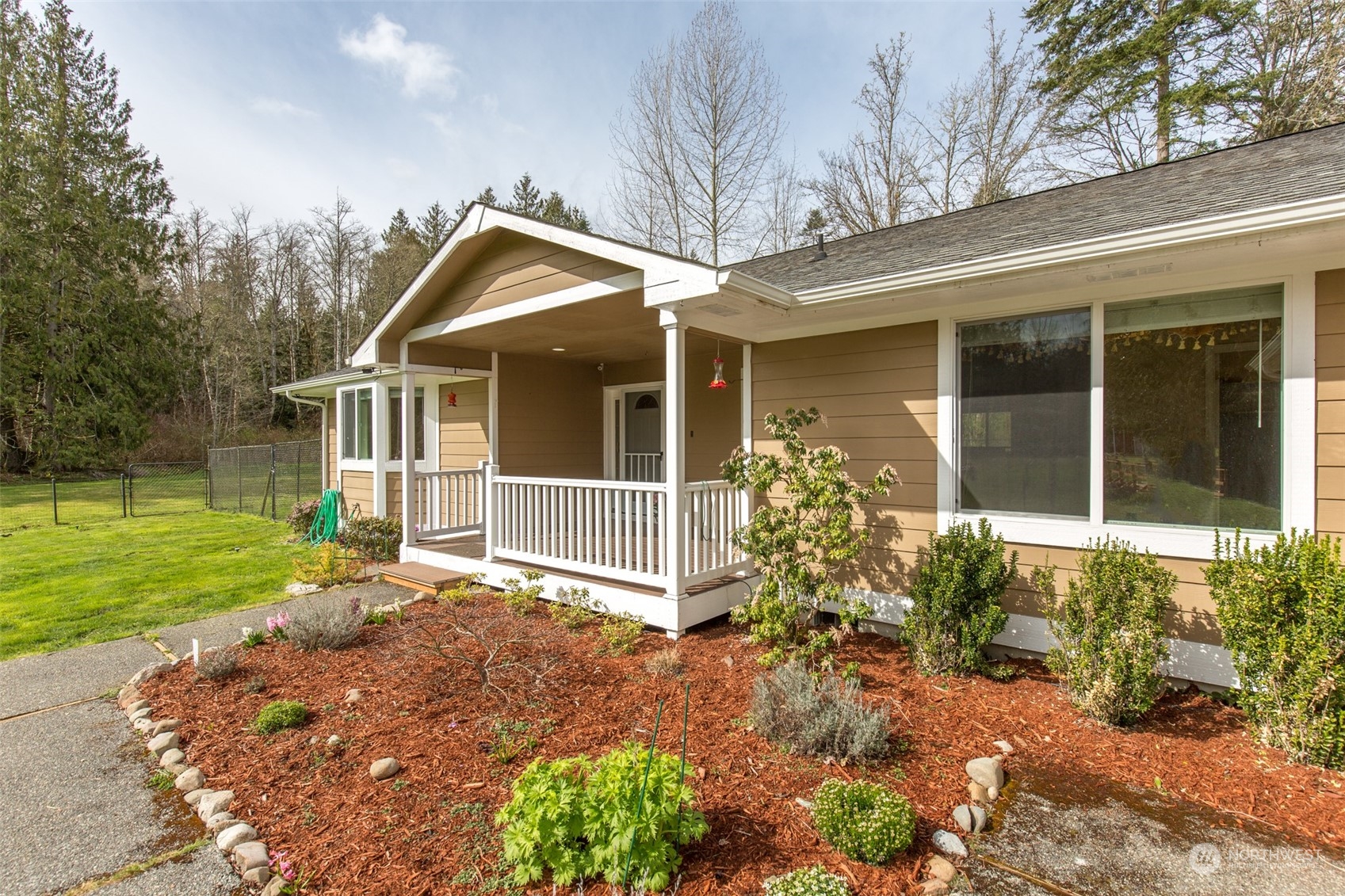 371 Autumn Road Sequim, WA 98382 - Photo 3 of 39 front view of a house with a yard and an outdoor space