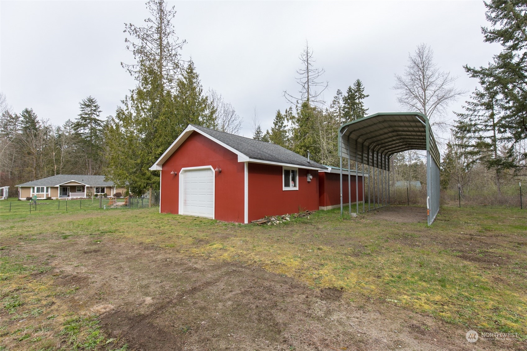 371 Autumn Road Sequim, WA 98382 - Photo 32 of 39 a view of backyard of house with green space