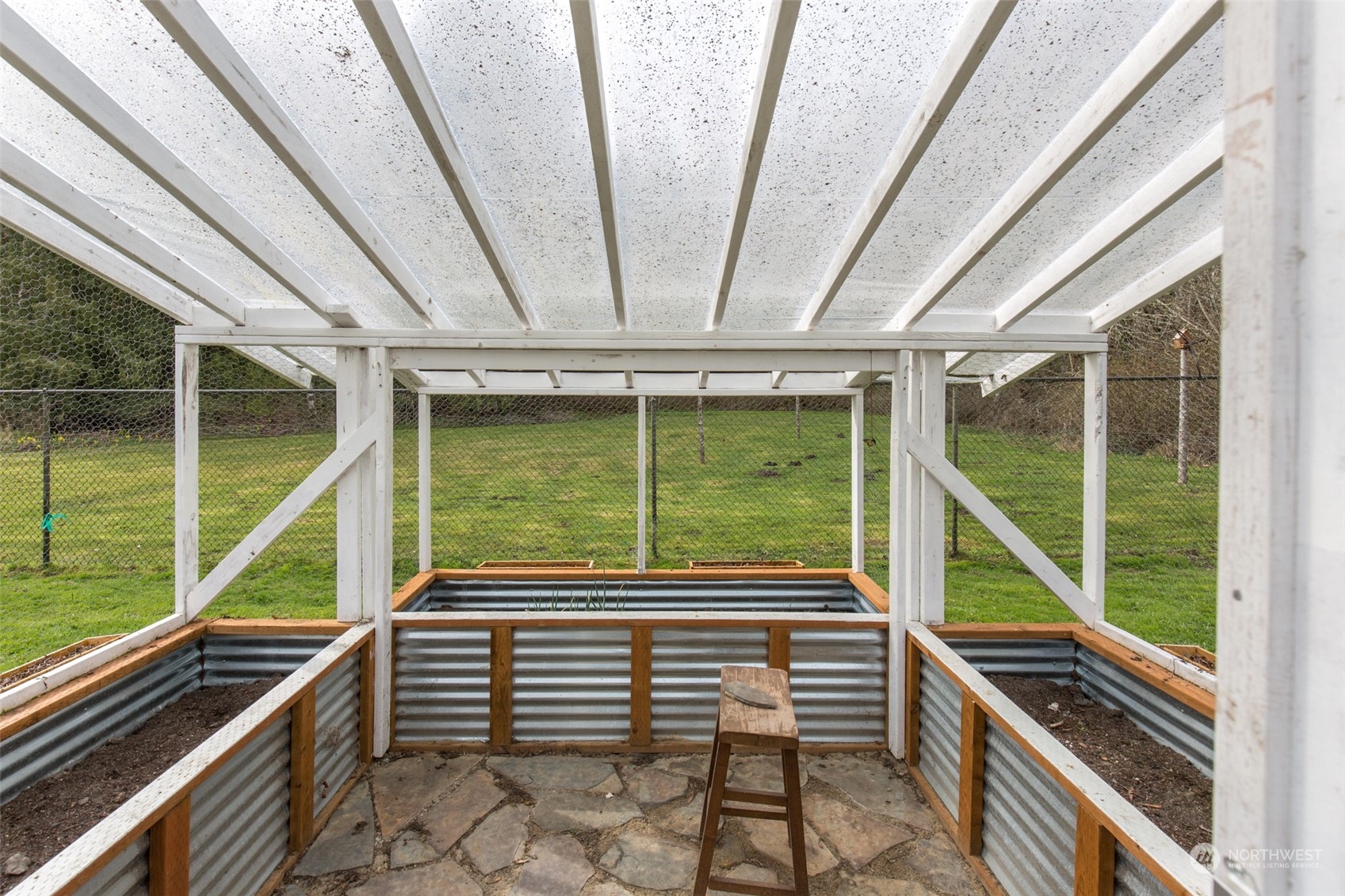 371 Autumn Road Sequim, WA 98382 - Photo 35 of 39 a view of a balcony with floor to ceiling windows with wooden floor