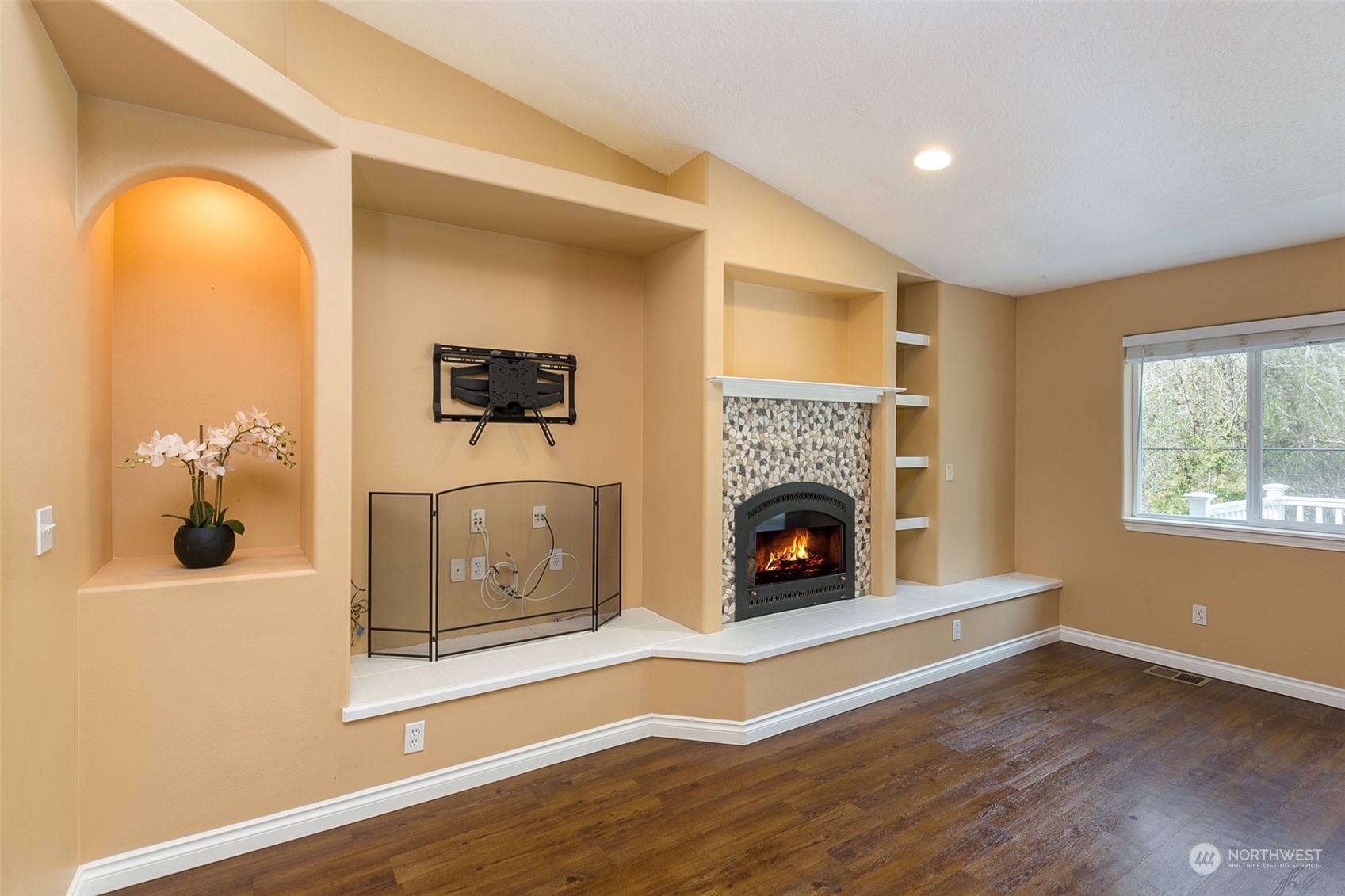 371 Autumn Road Sequim, WA 98382 - Photo 7 of 39 a living room with furniture and a fireplace