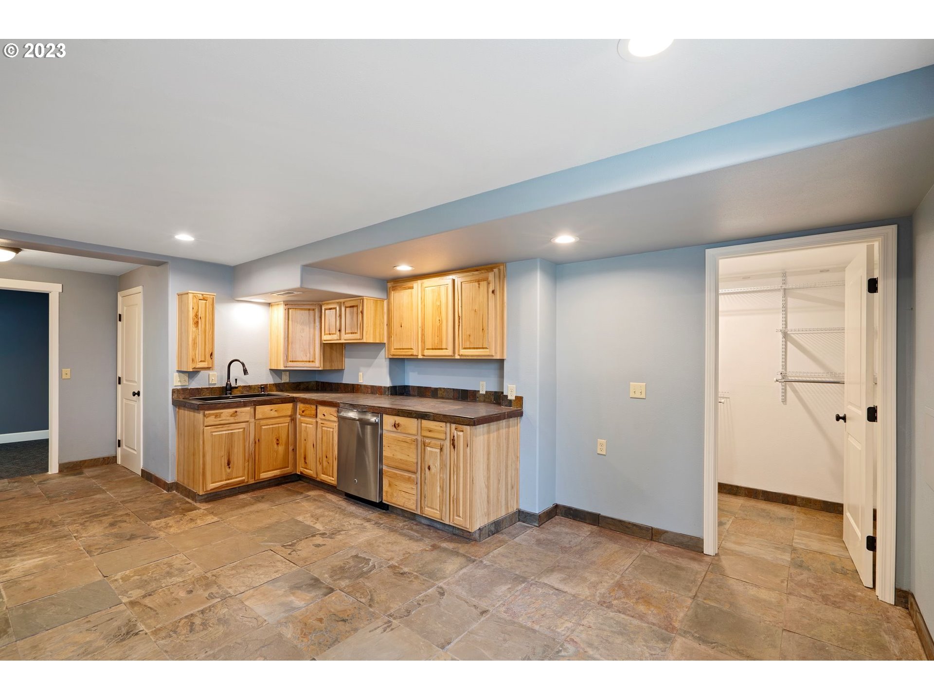 1635 Davis Road South Salem, OR 97306 - Photo 44 of 46 a kitchen with stainless steel appliances granite countertop a stove a sink and a refrigerator