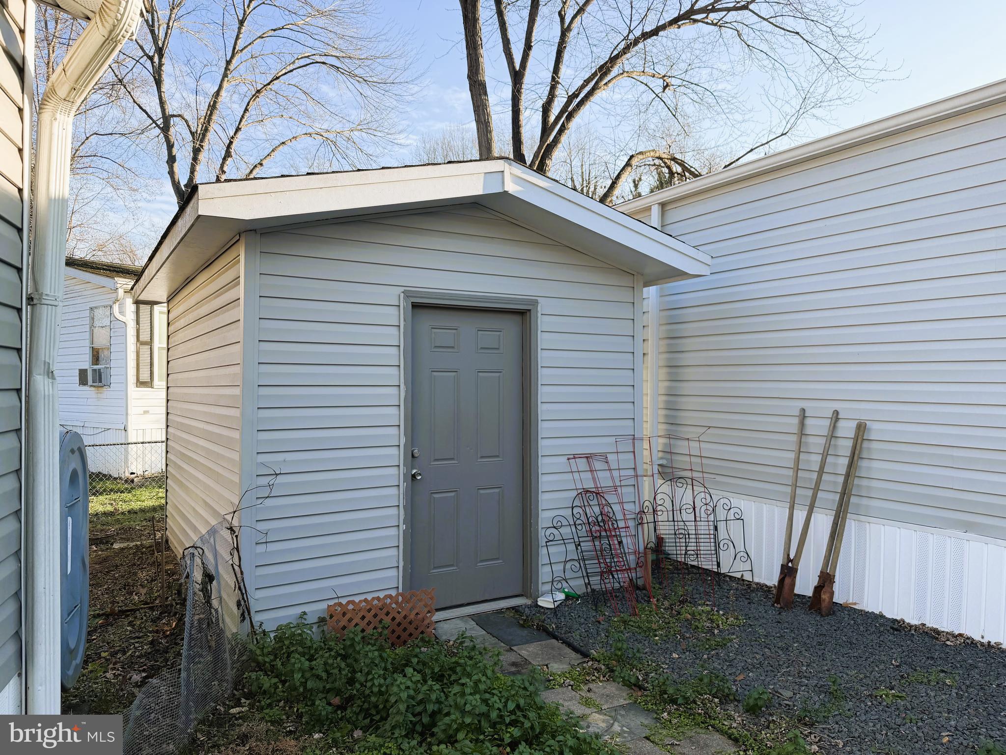 31 Courage Lane Stafford, VA 22554 - Photo 14 of 14 a view of a house with a small yard and potted plants