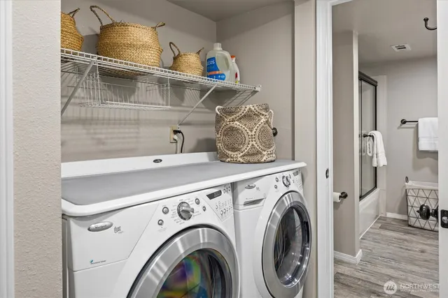 a utility room with dryer and washer