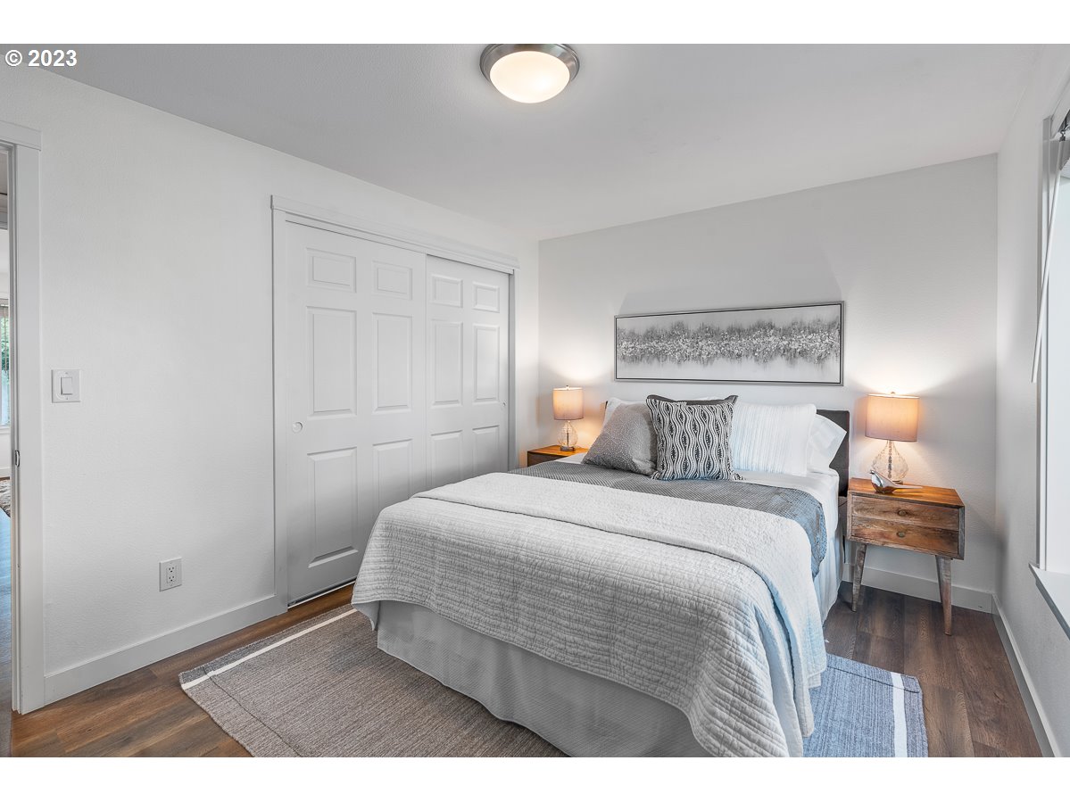 14720 Southwest Glenbrook Road Beaverton, OR 97007 - Photo 25 of 43 a bedroom with a bed and window