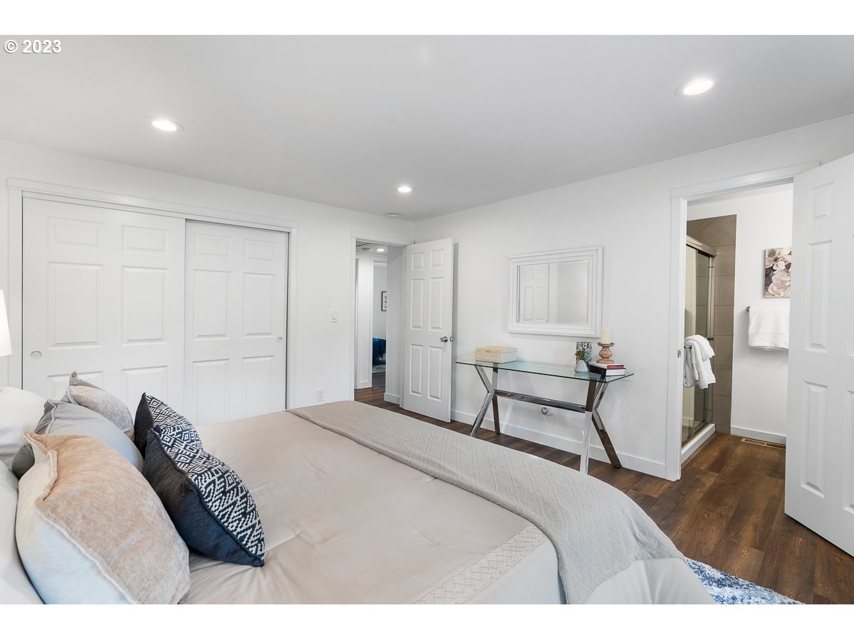 14720 Southwest Glenbrook Road Beaverton, OR 97007 - Photo 28 of 43 a bedroom with a bed and a chair
