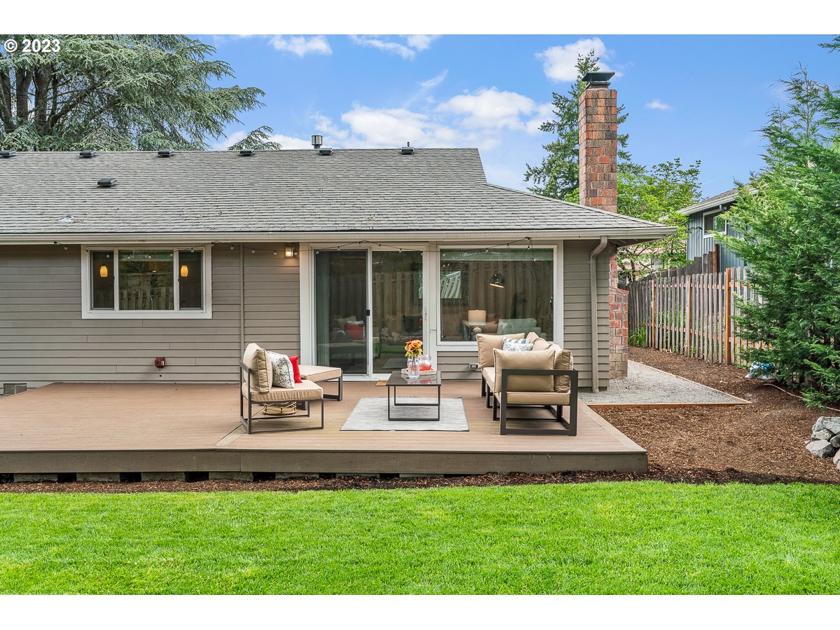 14720 Southwest Glenbrook Road Beaverton, OR 97007 - Photo 33 of 43 a view of a house with backyard porch and sitting area