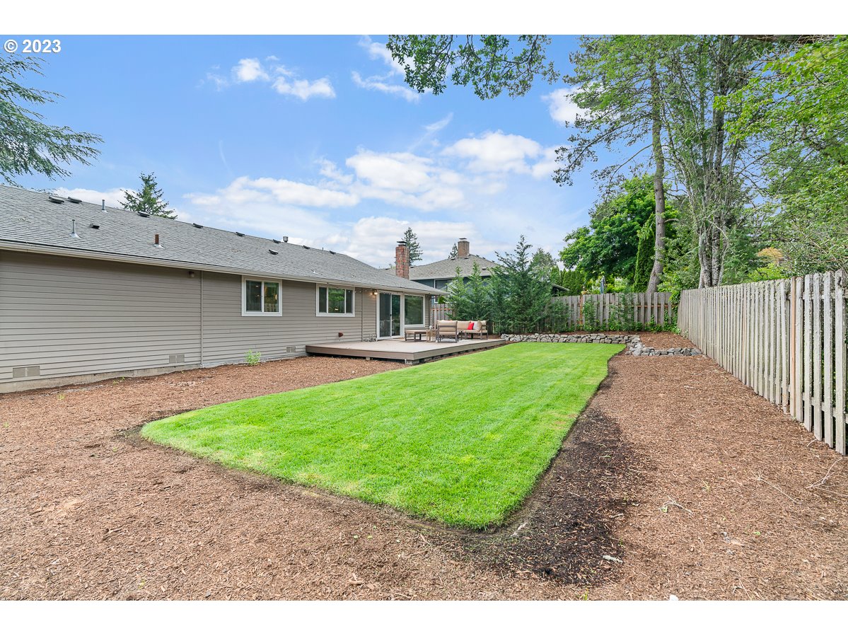 14720 Southwest Glenbrook Road Beaverton, OR 97007 - Photo 35 of 43 a view of a house with a yard