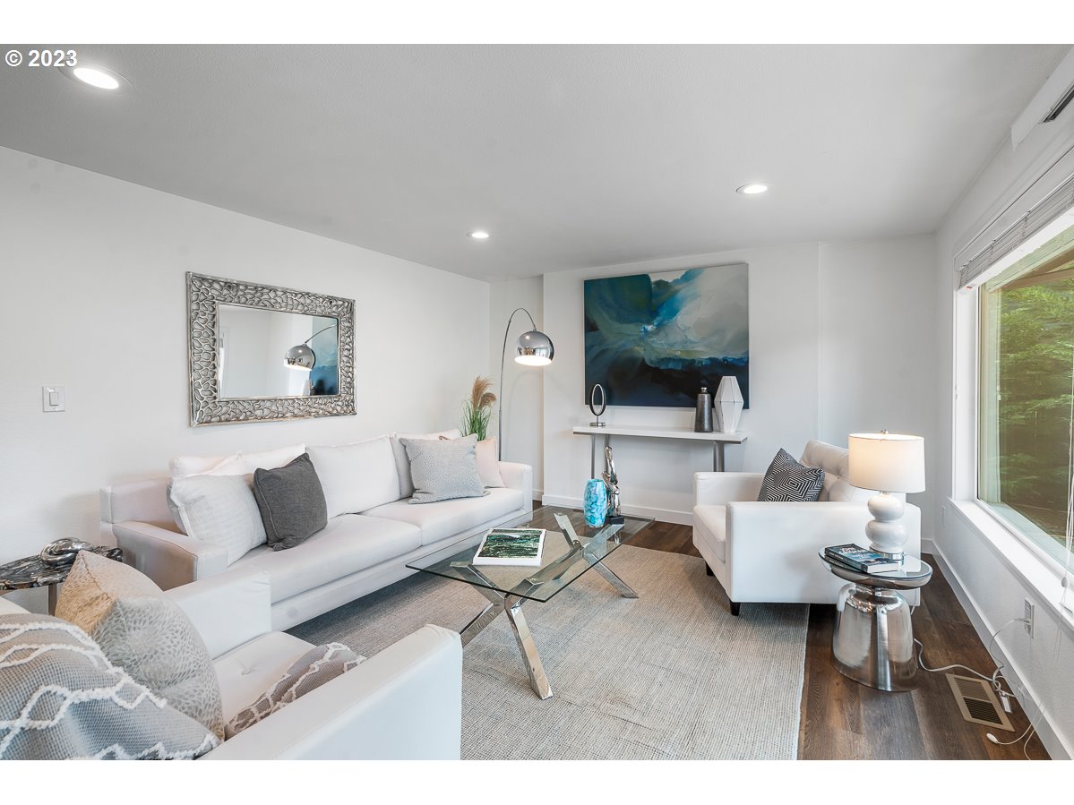 14720 Southwest Glenbrook Road Beaverton, OR 97007 - Photo 5 of 43 a living room with furniture and a flat screen tv