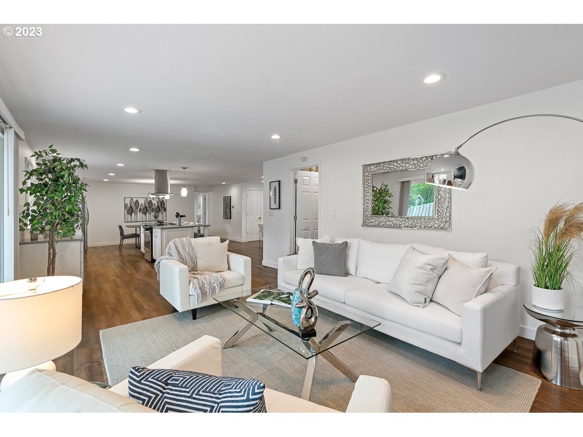 14720 Southwest Glenbrook Road Beaverton, OR 97007 - Photo 6 of 43 a living room with furniture and a rug