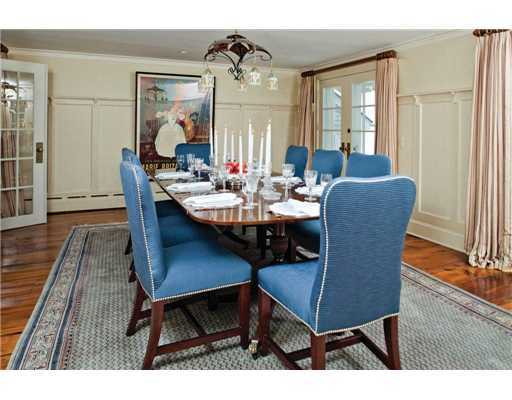336 Stanwich Road Greenwich, CT 06830 - Photo 4 of 7 a dining room with furniture a rug and wooden floor