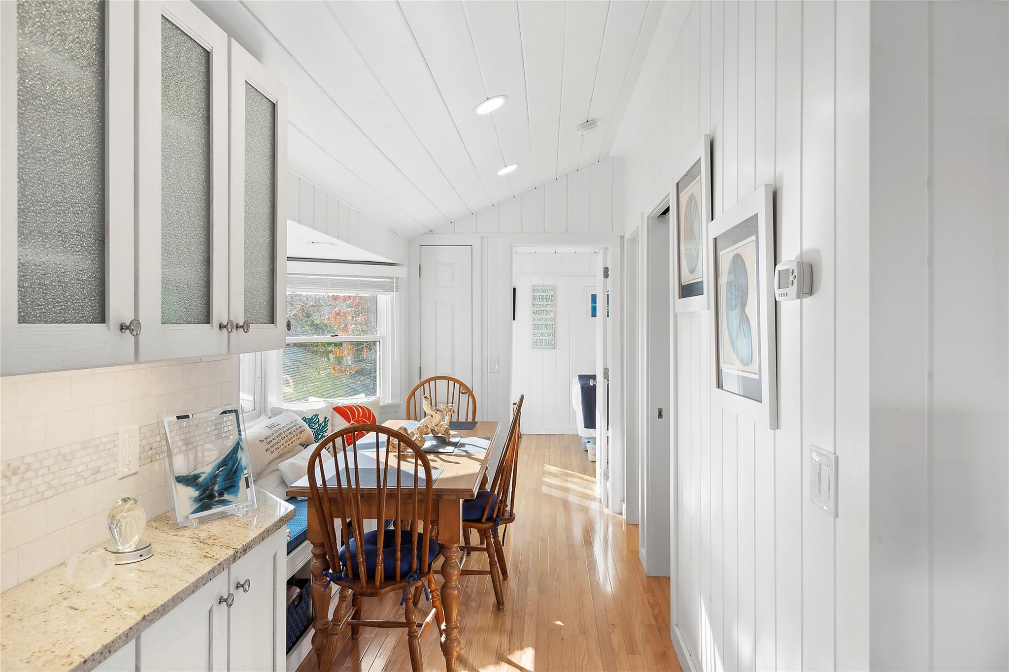 67 North Road, Unit A Hampton Bays, NY 11946 - Photo 11 of 17 Dining room with vaulted ceiling, light wood-type flooring, and recessed lighting