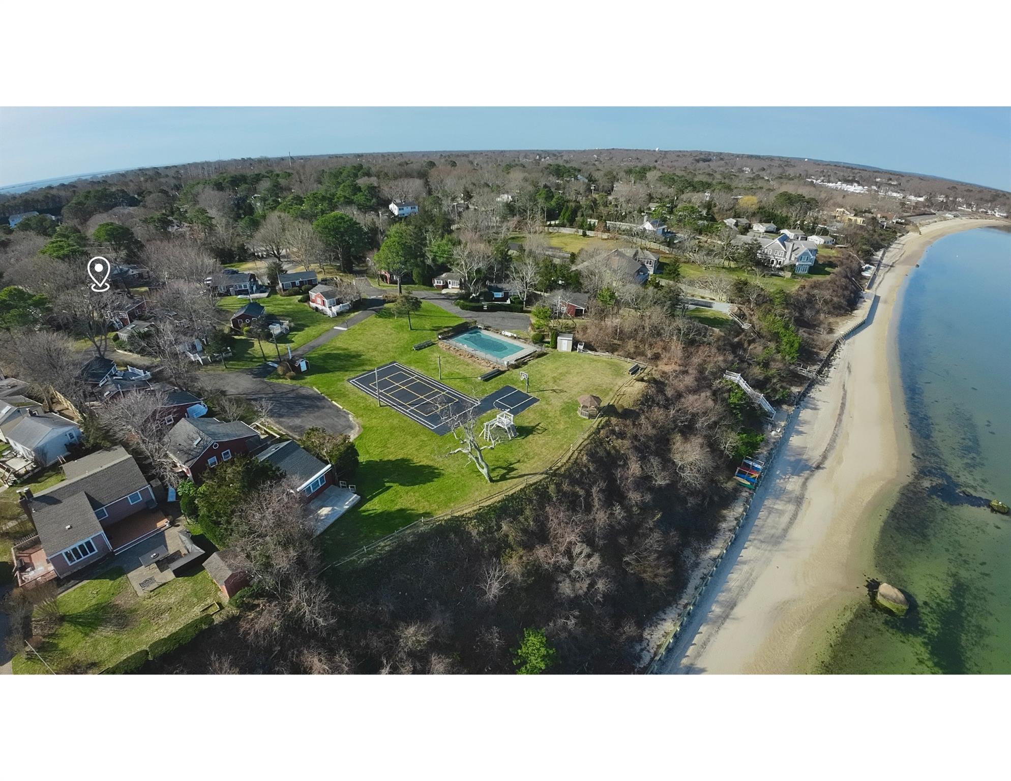 67 North Road, Unit A Hampton Bays, NY 11946 - Photo 17 of 17 View of property location with nearby suburban area and a nearby body of water