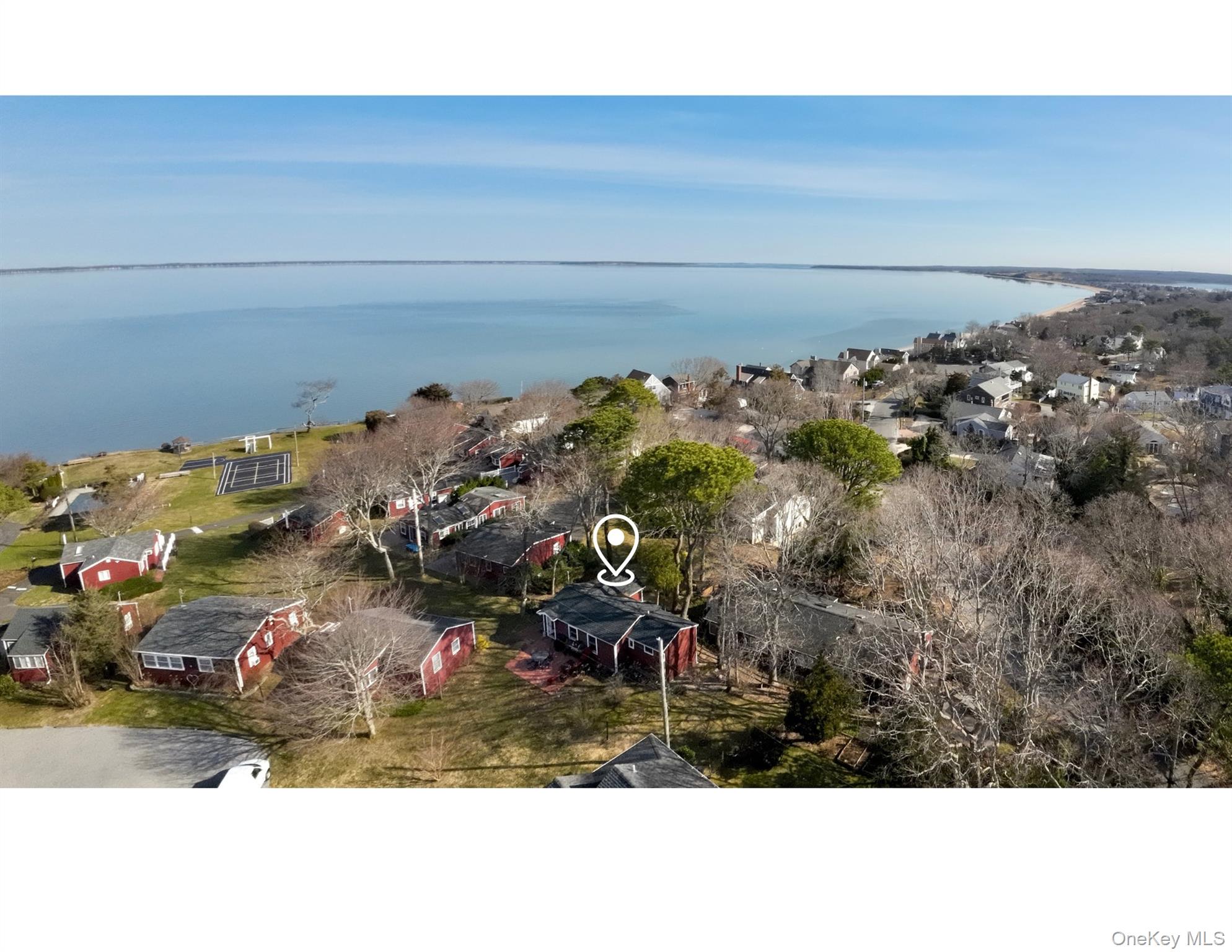 67 North Road, Unit A Hampton Bays, NY 11946 - Photo 2 of 17 a view of water heater and room
