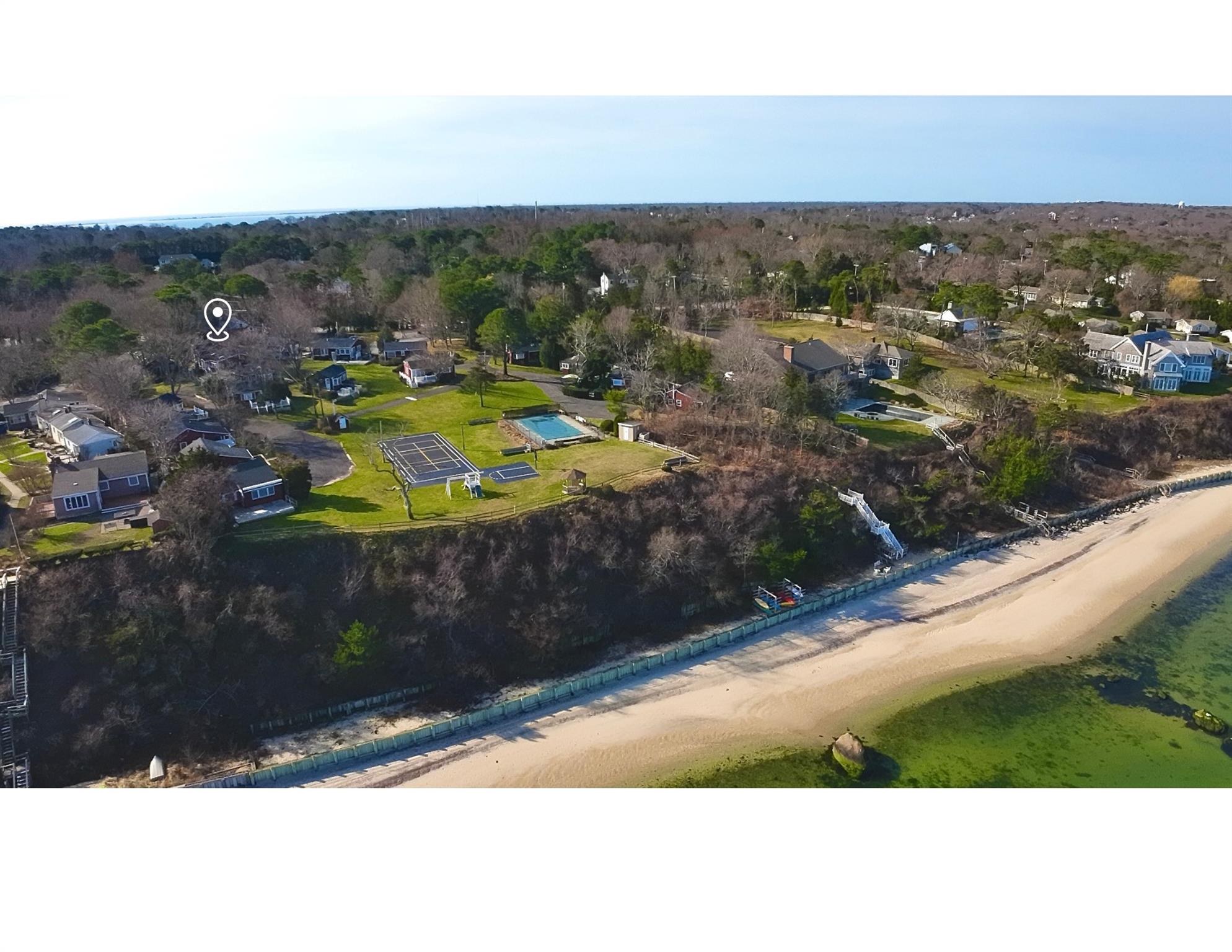 67 North Road, Unit A Hampton Bays, NY 11946 - Photo 3 of 17 Aerial view of residential area