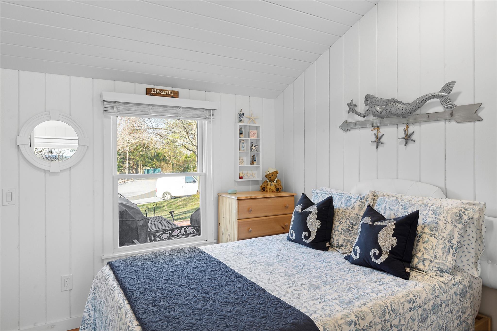 67 North Road, Unit A Hampton Bays, NY 11946 - Photo 8 of 17 Bedroom featuring lofted ceiling