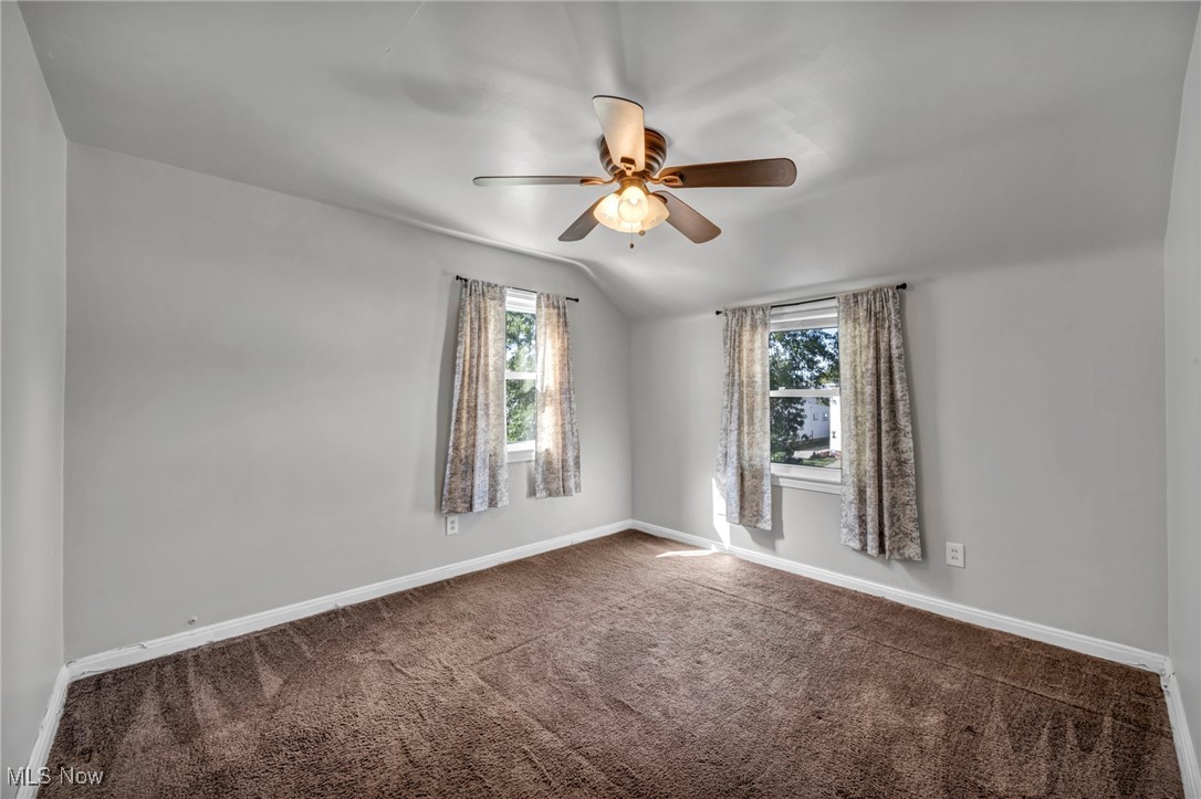 12930 Havana Road Cleveland, OH 44125 - Photo 19 of 37 Bedroom with ceiling fan and carpet