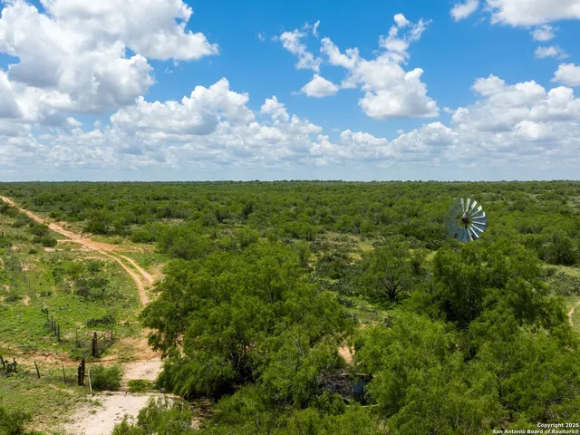 a view of a lake with a houses