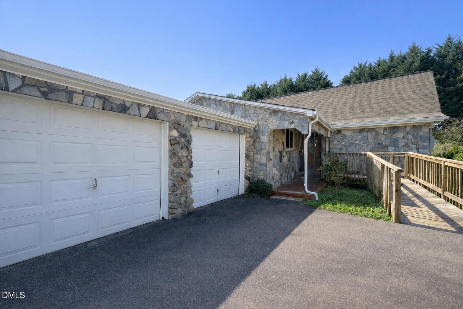 151 Watson Road Norlina, NC 27563 - Photo 4 of 16 a view of a house with a garage
