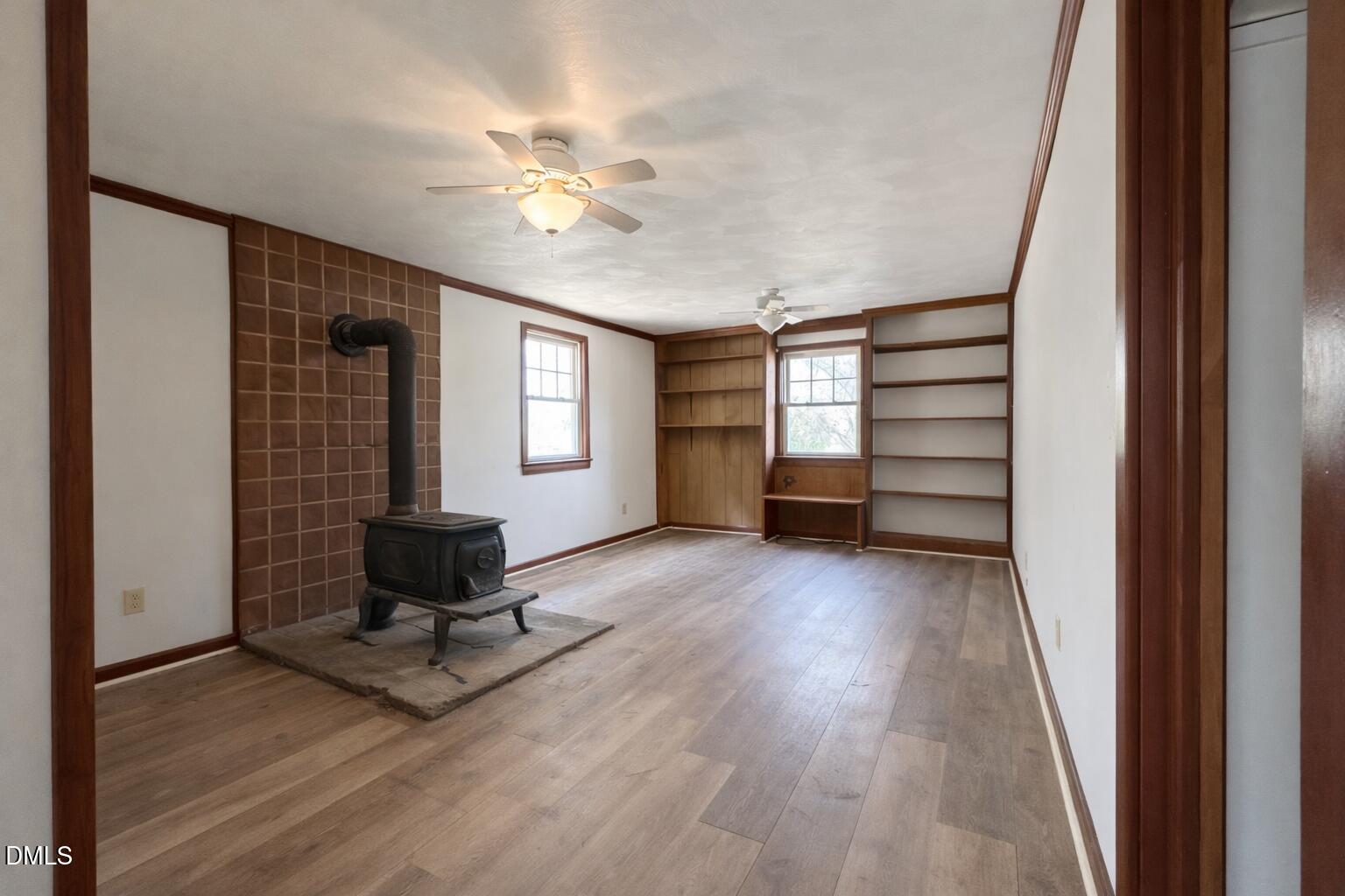 151 Watson Road Norlina, NC 27563 - Photo 10 of 16 a view of livingroom with hardwood floor and a ceiling fan