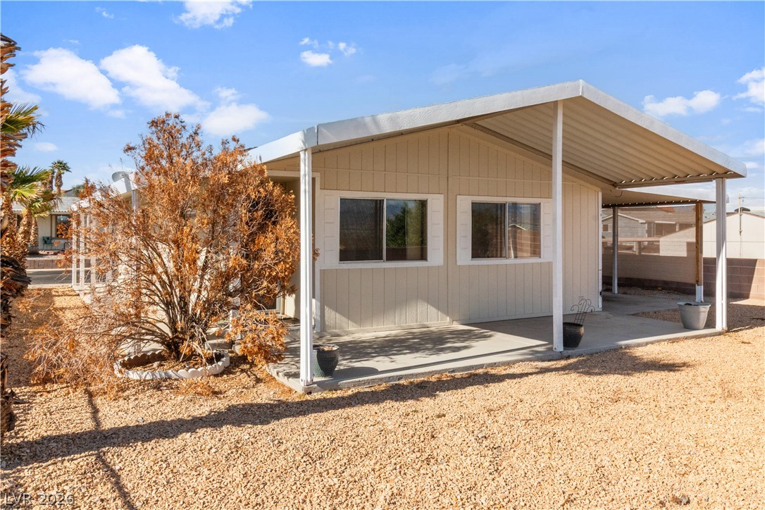 1671 Granada Street Laughlin, NV 89029 - Photo 39 of 63 Rear view of property with a patio area