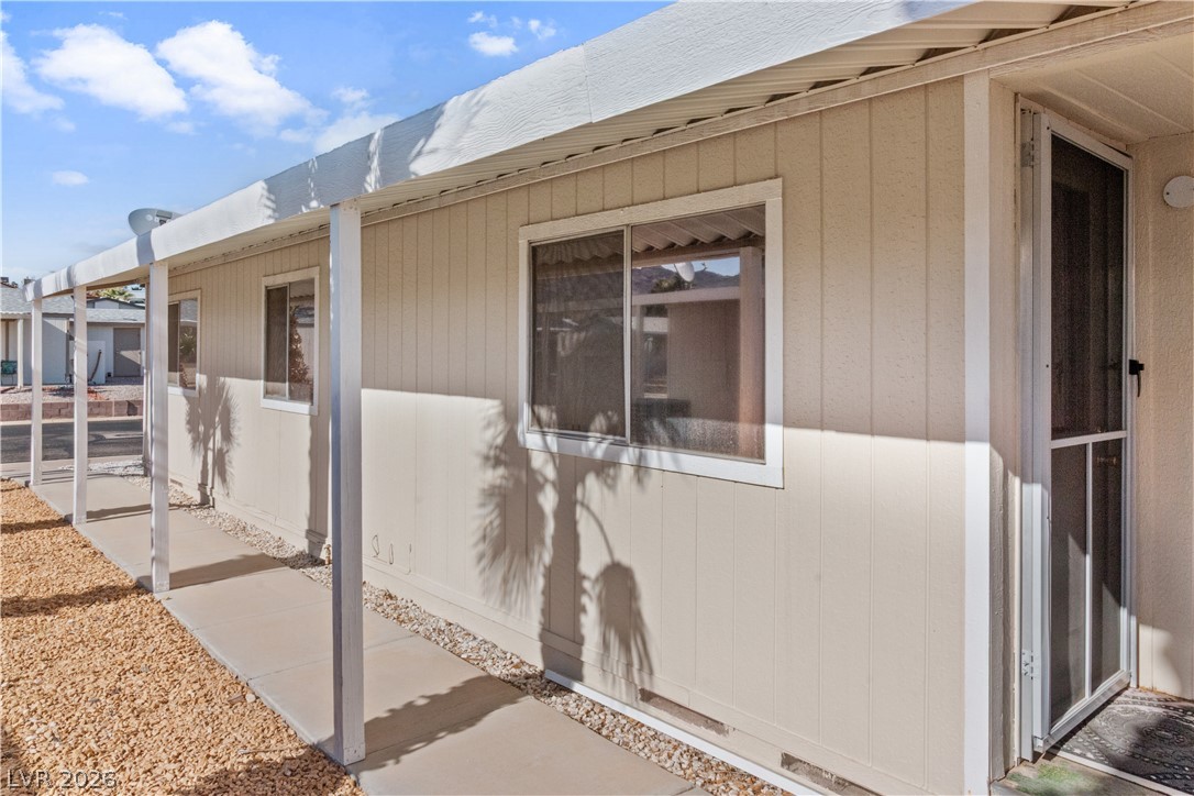 1671 Granada Street Laughlin, NV 89029 - Photo 4 of 63 View of side of property