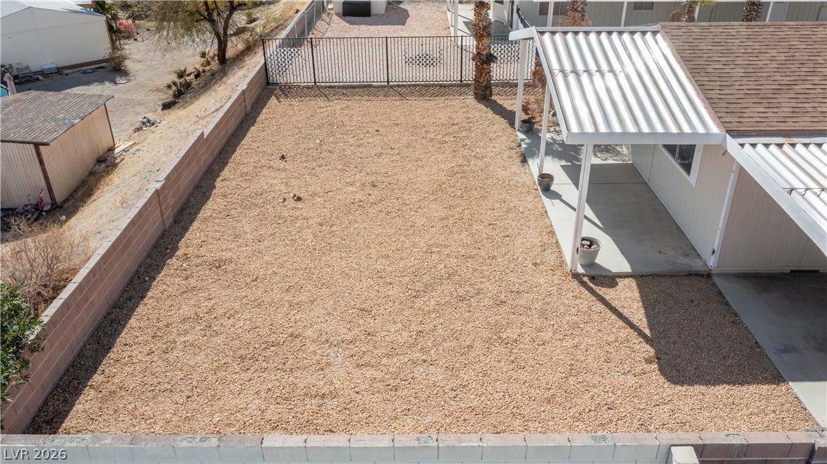 1671 Granada Street Laughlin, NV 89029 - Photo 53 of 63 View of yard with a fenced backyard