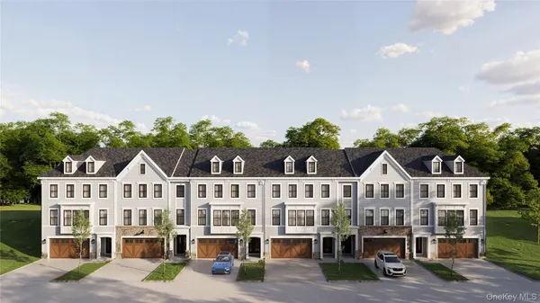 a view of residential houses with city street