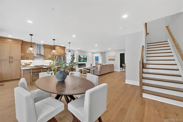 a kitchen with a table and chairs in it