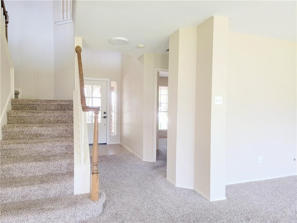 610 Cenizo Path Cedar Park, TX 78613 - Photo 3 of 18 a view of a hallway with wooden floor