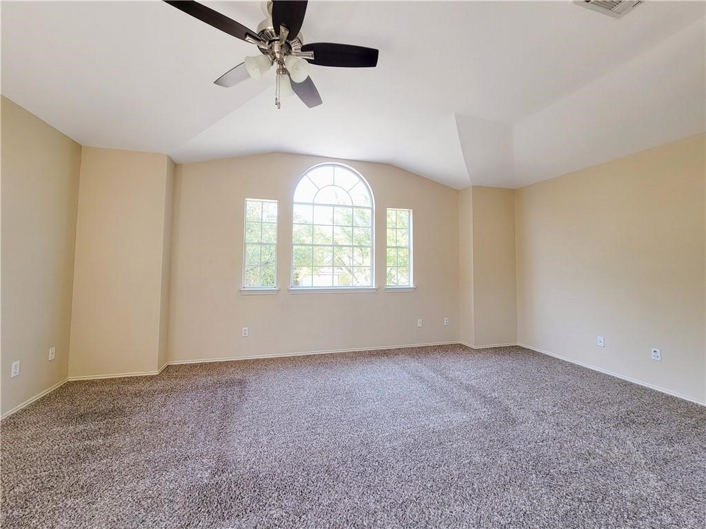 610 Cenizo Path Cedar Park, TX 78613 - Photo 10 of 18 wooden floor in an empty room with a window
