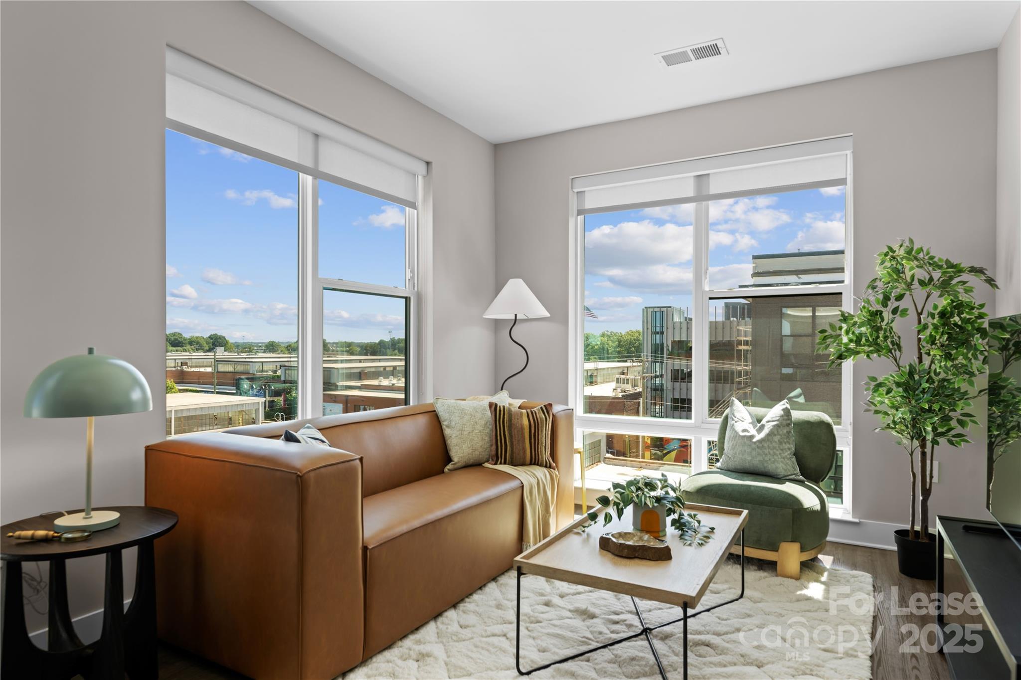 110 Razades Way, Unit B2 Charlotte, NC 28206 - Photo 26 of 29 a living room with furniture and a large window