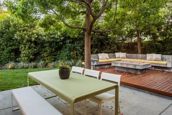 a view of yard from deck patio and outdoor seating