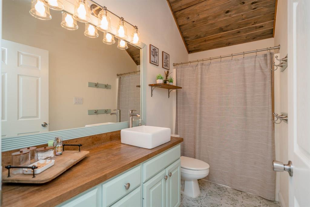 234 Spring Lake Knoll Trail Holly Lake Ranch, TX 75765 - Photo 14 of 20 a bathroom with a granite countertop sink toilet and shower