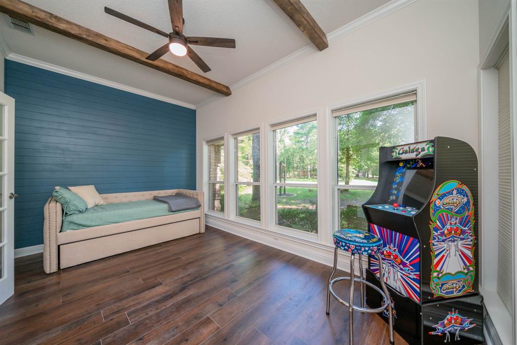 234 Spring Lake Knoll Trail Holly Lake Ranch, TX 75765 - Photo 17 of 20 a living room with furniture and a floor to ceiling window