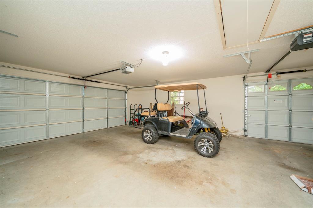 234 Spring Lake Knoll Trail Holly Lake Ranch, TX 75765 - Photo 20 of 20 a view of a garage with furniture