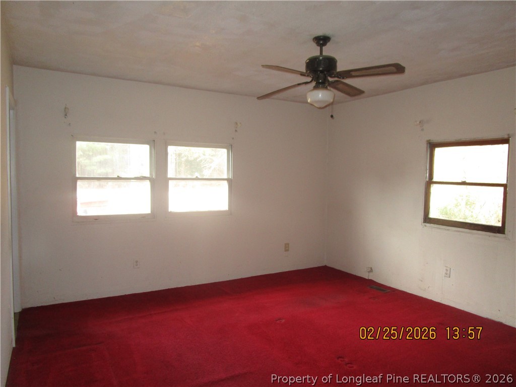 256 Chesters Road Roseboro, NC 28382 - Photo 18 of 22 an empty room with a window