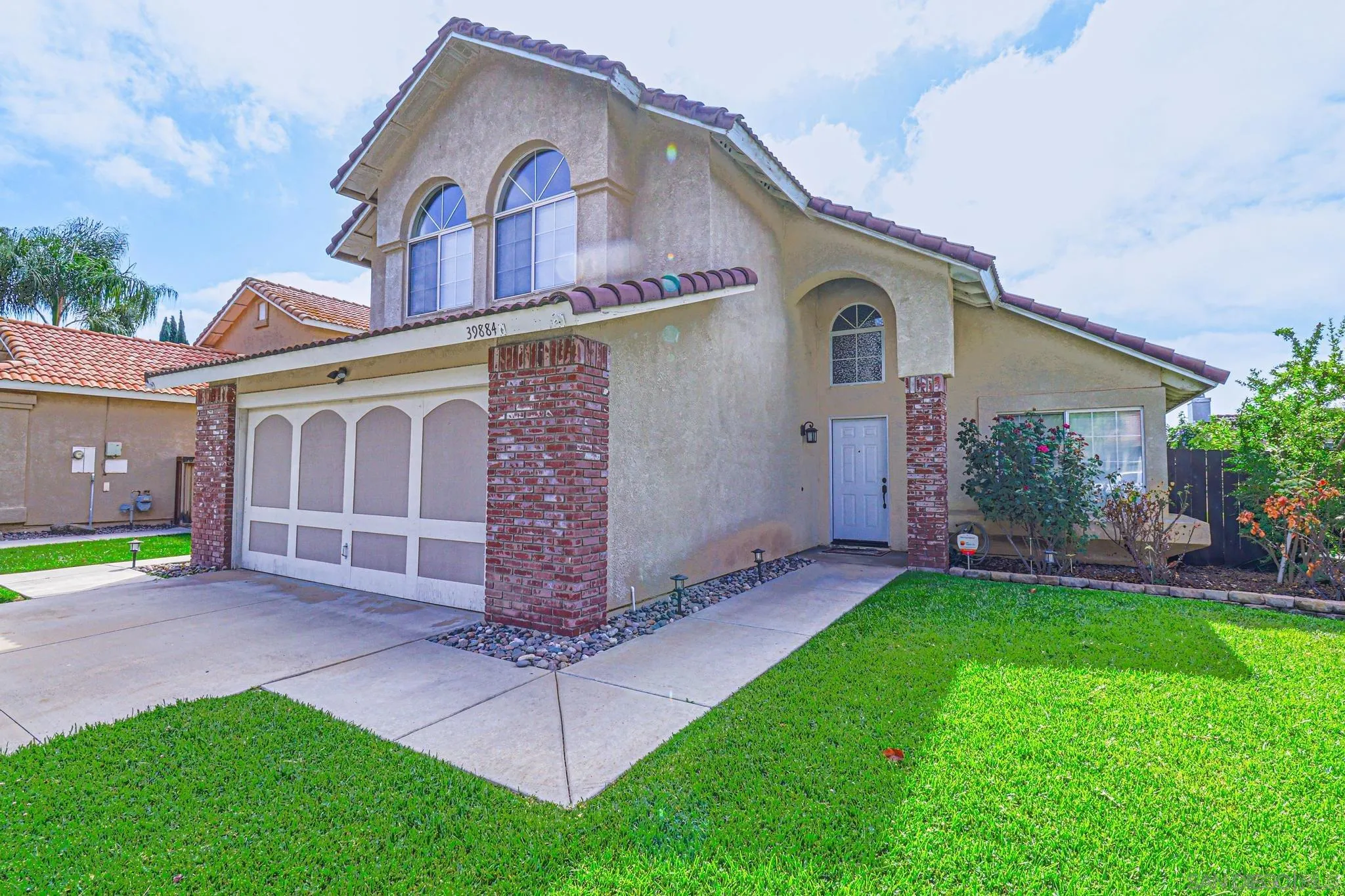 39884 North General Kearny Road Temecula, CA 92591 - Photo 1 of 58 a view of an house with backyard and a tree