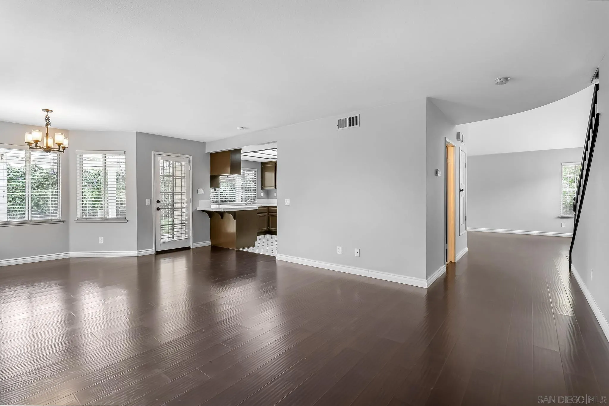 39884 North General Kearny Road Temecula, CA 92591 - Photo 18 of 58 an empty room with wooden floor and windows