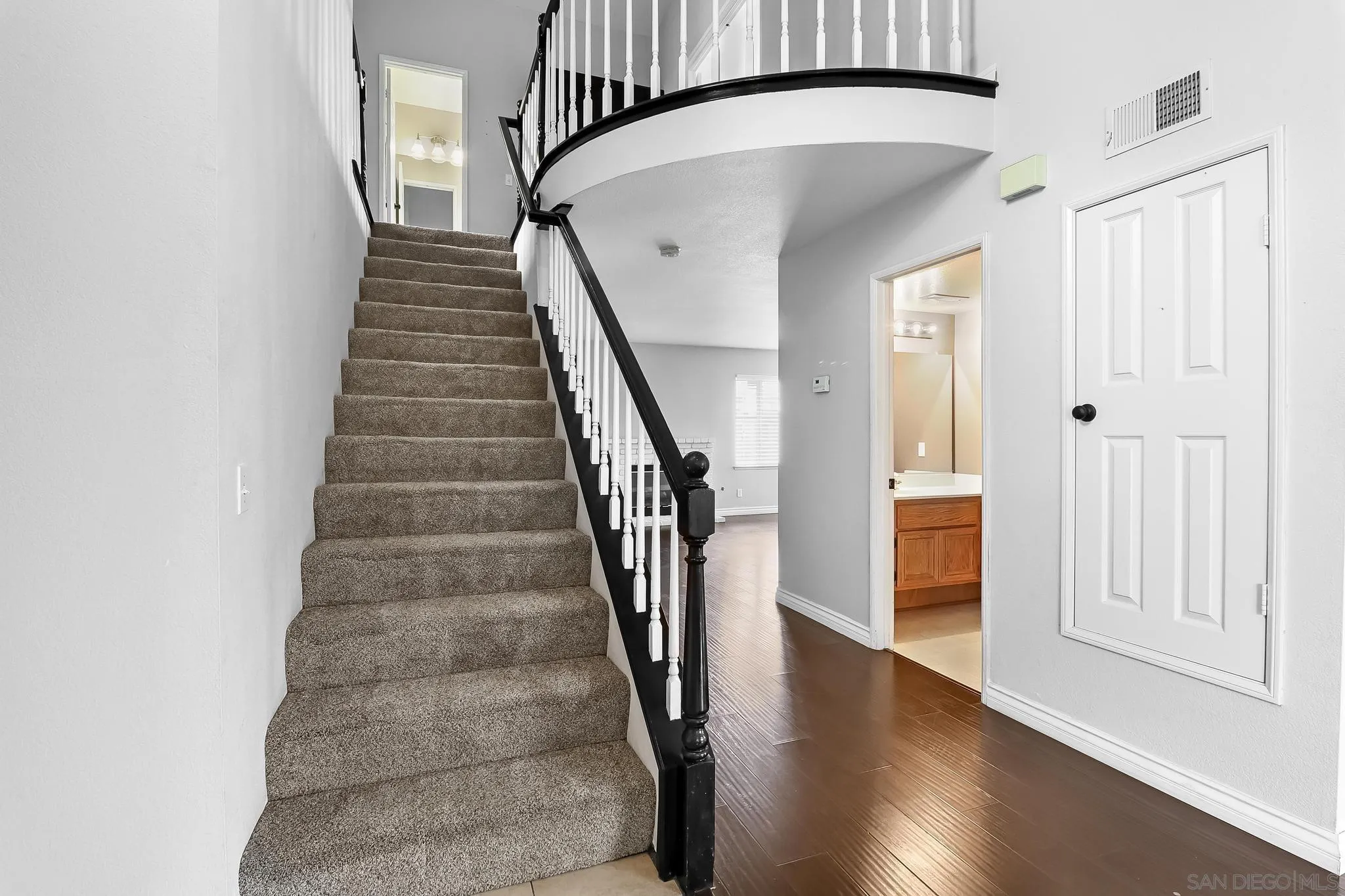 39884 North General Kearny Road Temecula, CA 92591 - Photo 21 of 58 a view of entryway with wooden floor and stairs