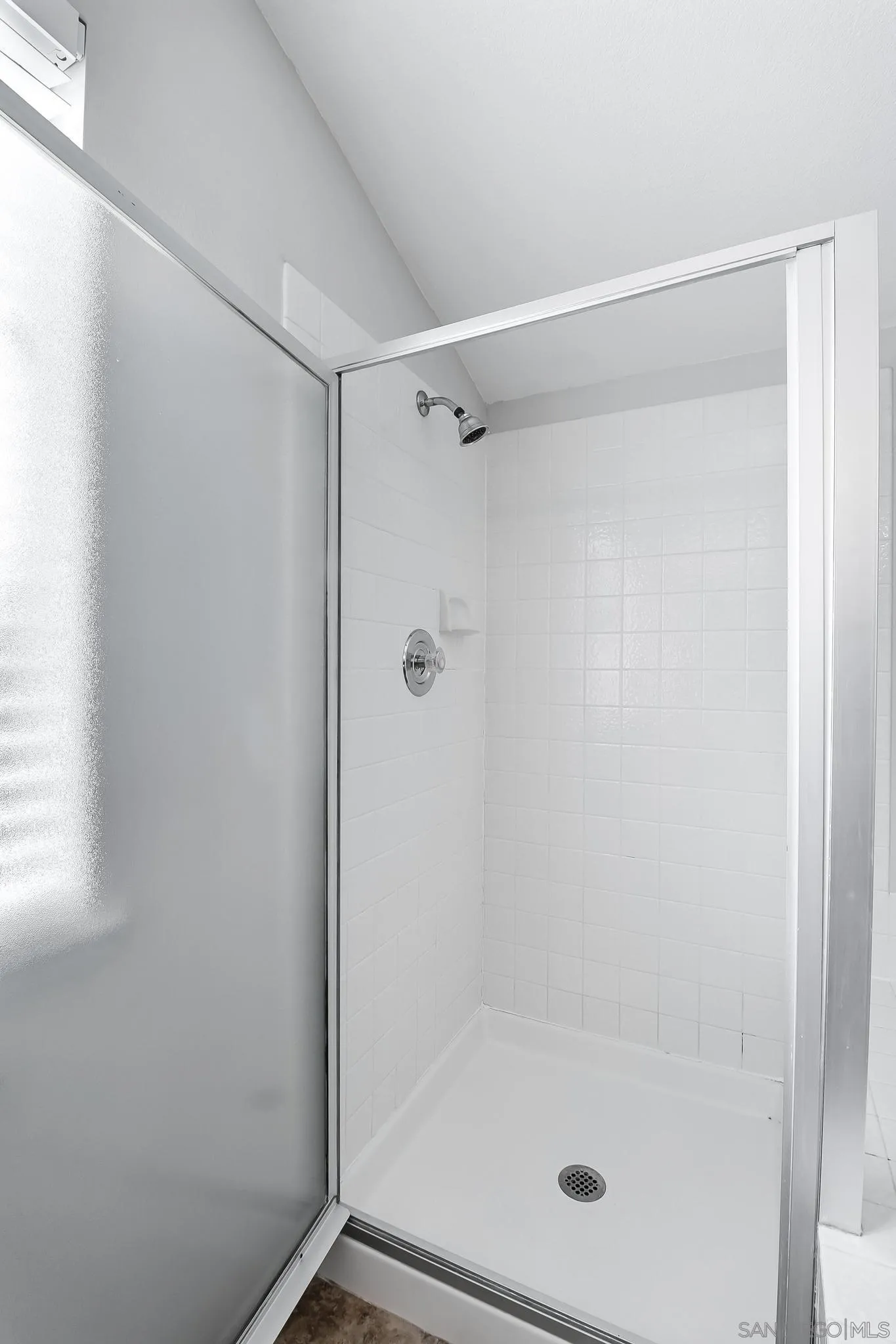 39884 North General Kearny Road Temecula, CA 92591 - Photo 39 of 58 a bathroom with a glass shower door