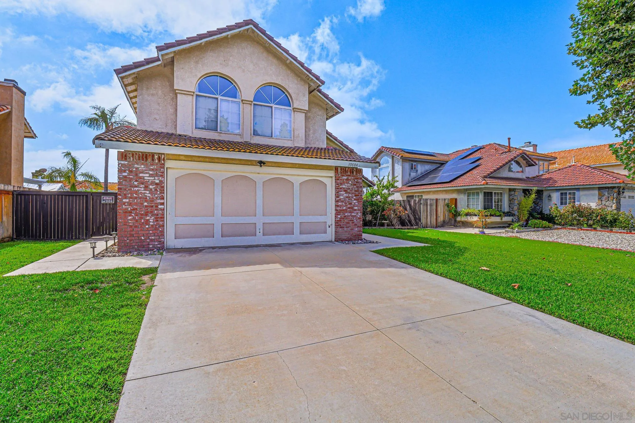 39884 North General Kearny Road Temecula, CA 92591 - Photo 4 of 58 front view of a house with a yard