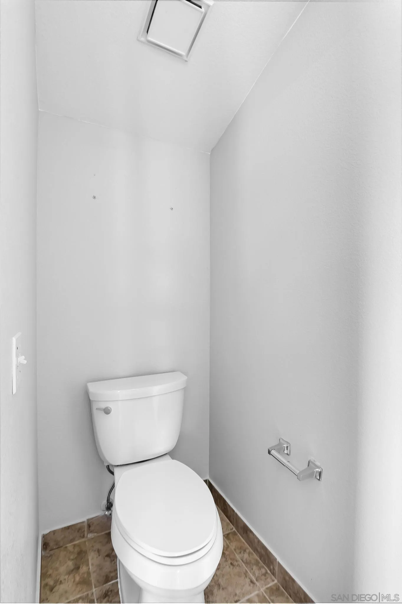 39884 North General Kearny Road Temecula, CA 92591 - Photo 43 of 58 a white toilet sitting next to a white wall