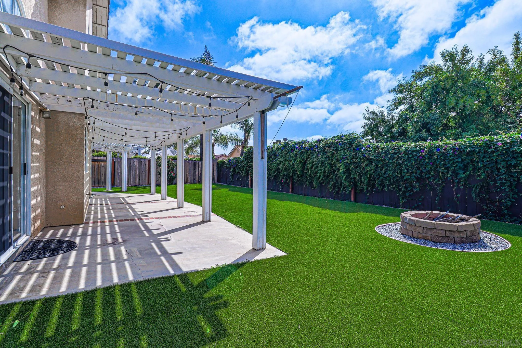 39884 North General Kearny Road Temecula, CA 92591 - Photo 45 of 58 a view of a patio with a yard
