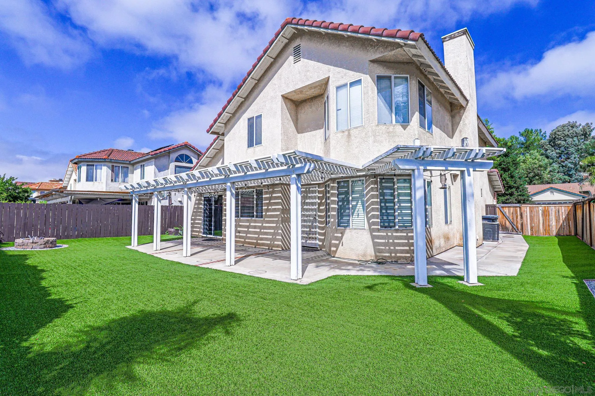 39884 North General Kearny Road Temecula, CA 92591 - Photo 47 of 58 a front view of a house with a yard