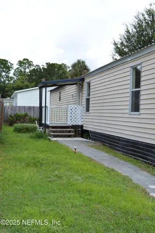 a view of a backyard with a garden