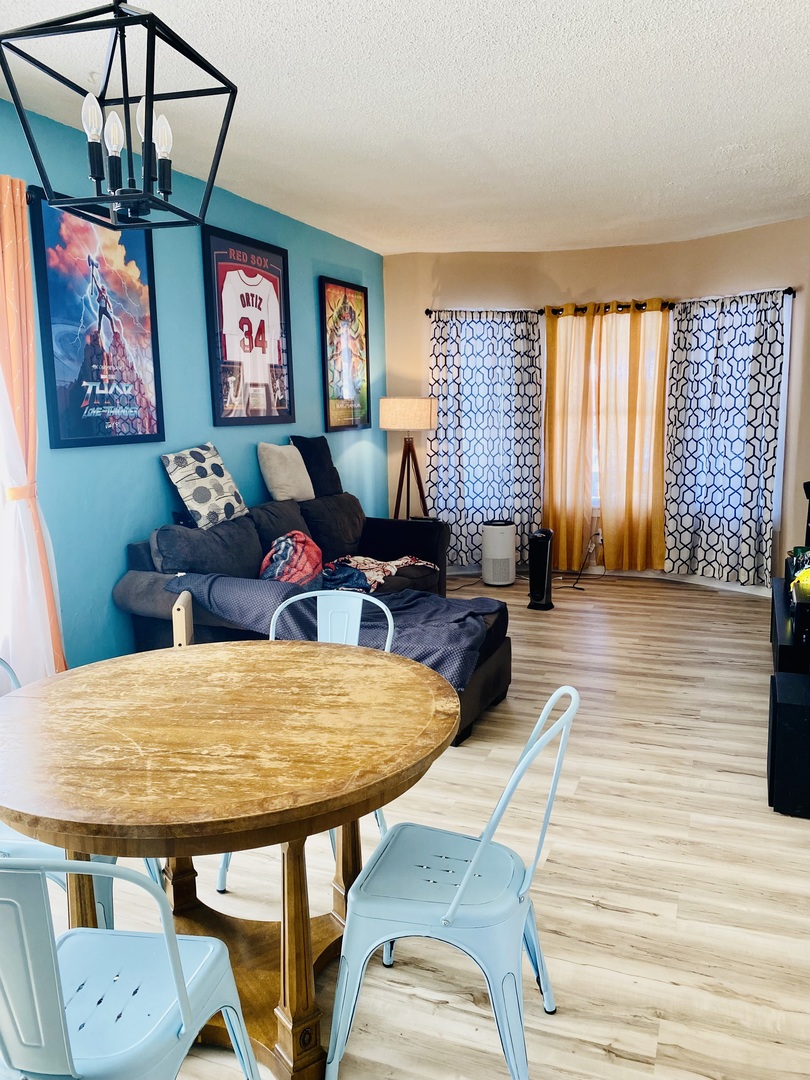 817 North 7th Street Rochelle, IL 61068 - Photo 4 of 14 a living room with furniture two large window and a wooden floor