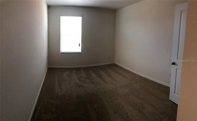 an empty room with closet