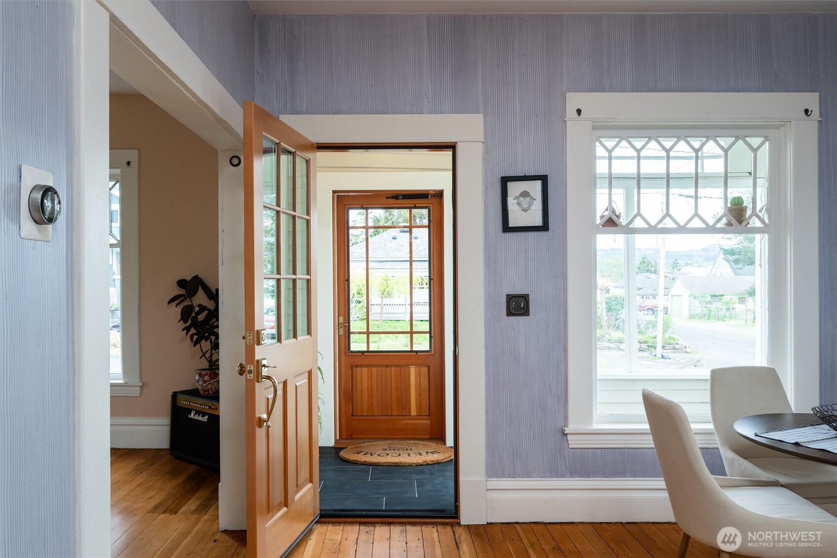 2301 I Street Bellingham, WA 98225 - Photo 14 of 28 a view of a hallway with wooden floor and a bedroom